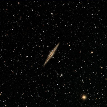 NGC 891 edge on barred spiral galaxy in Andromeda 30 million light years distant.