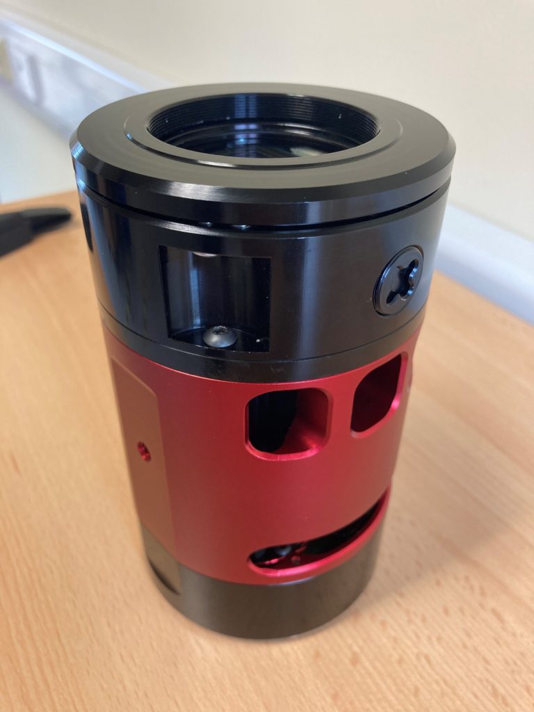 The camera mount features an adjustable tilt plate to ensure the whole image is in focus.